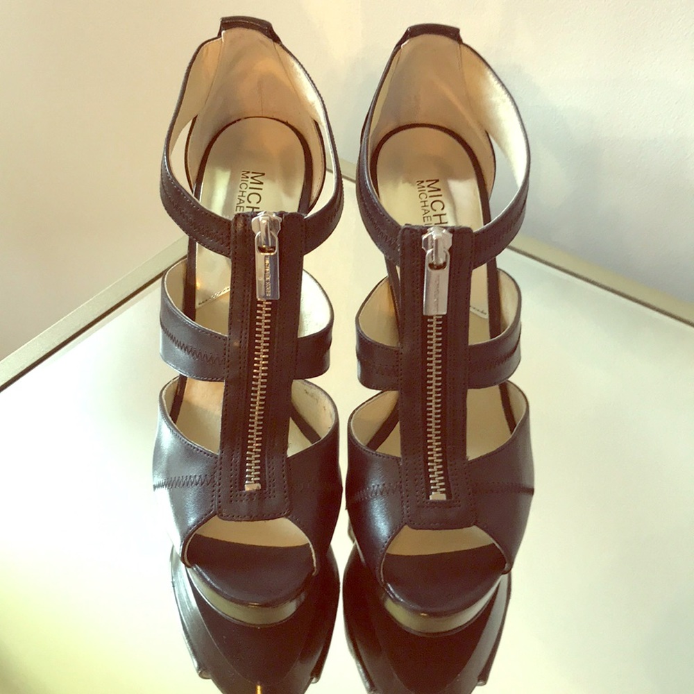 Black leather stilettos NWOT. Never worn.